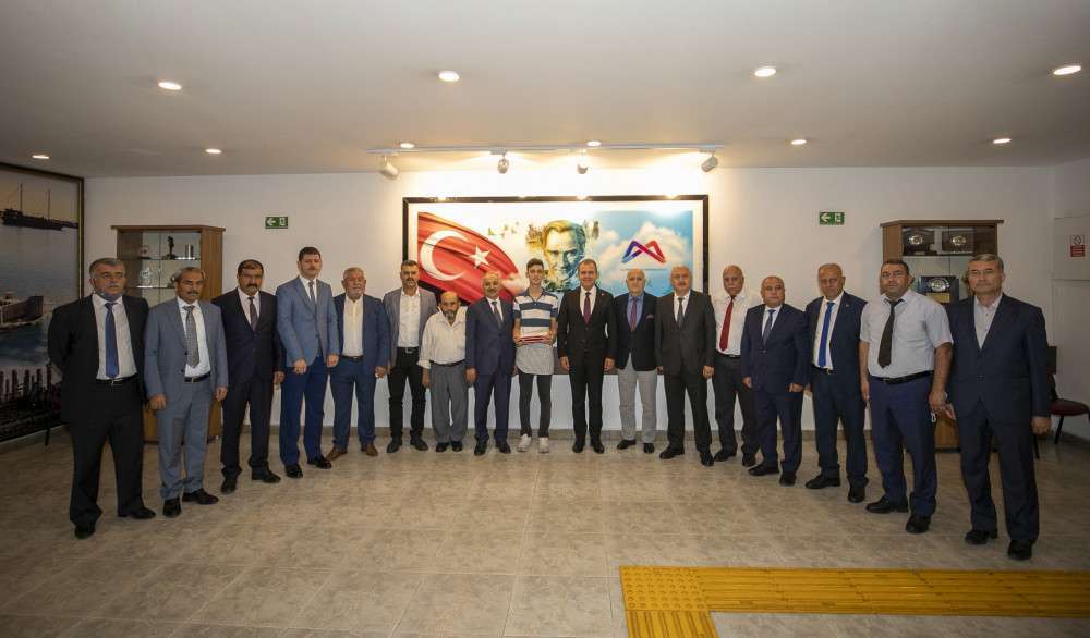 BAŞKAN SEÇER YILIN ÇIRAĞI EREN GÜÇLÜ YE KUŞAĞINI BAĞLADI